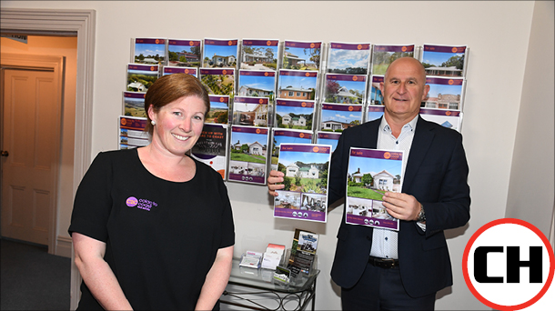 SURGING: Colac to Coast Real Estate’s Andrea Invermee says confidence in industry and living conditions have driven a boom in house prices in the Colac district. She is pictured with the agency’s Stuart Nelson.